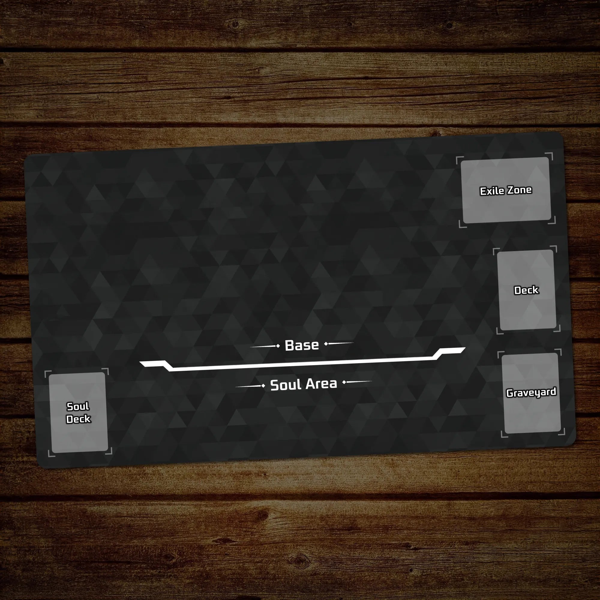A dark gray gaming playmat with a geometric pattern, laid flat on a rustic brown wooden surface. The playmat features white text and lines indicating zones: 'Base', 'Soul Area', 'Exit Zone', 'Deck', and 'Graveyard'.