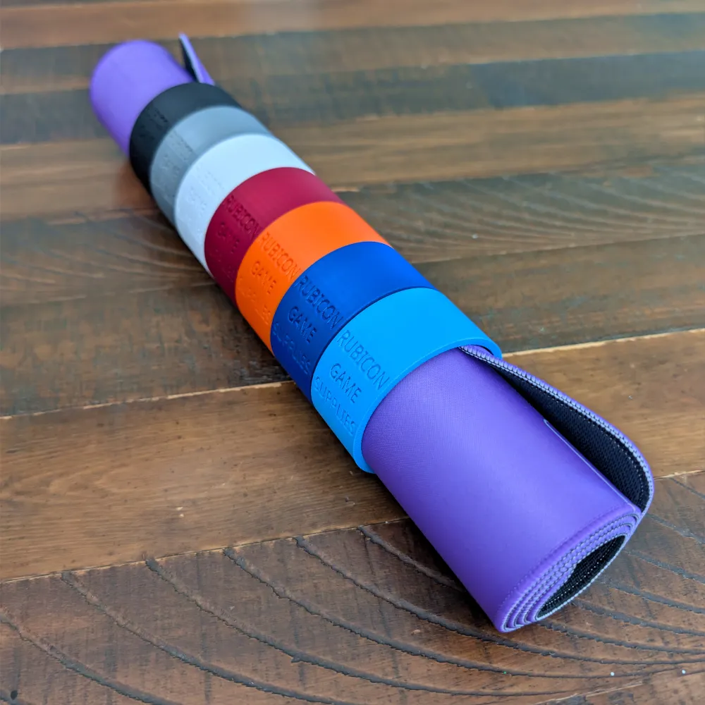 Rolled playmat multicolor 3D printed PLA rings set wood table